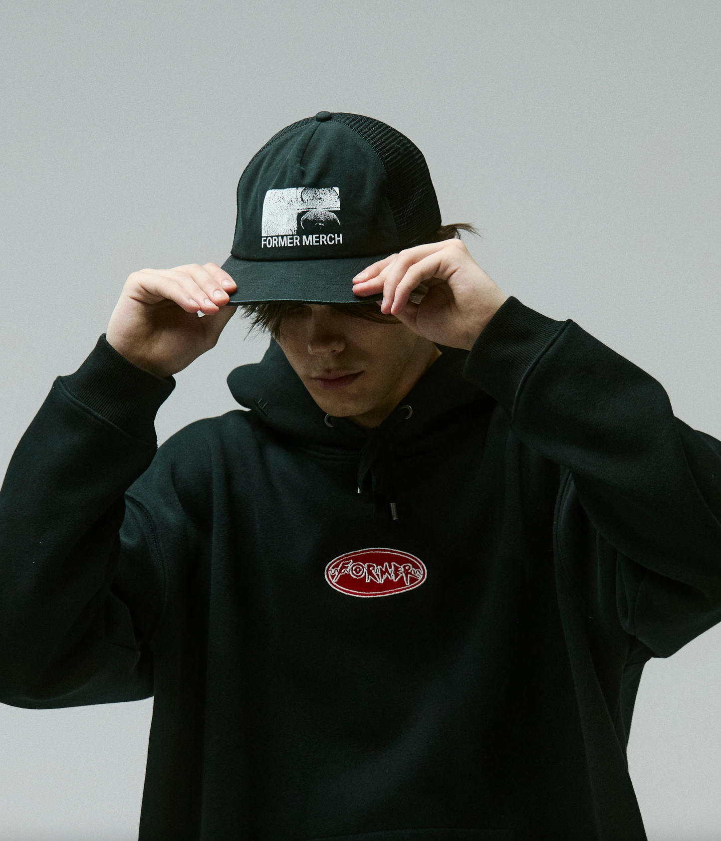 Former Synthesis Trucker Cap