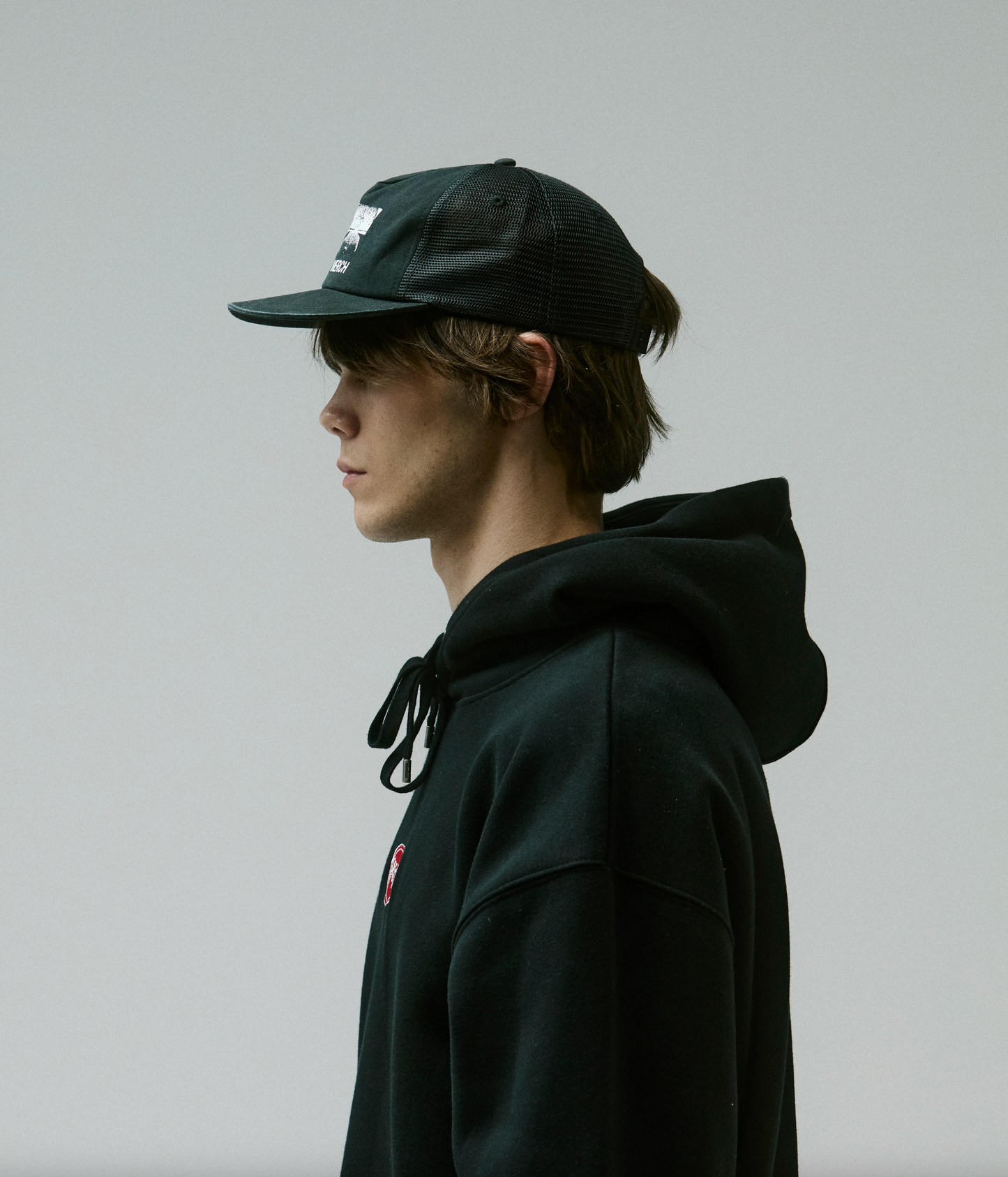 Former Synthesis Trucker Cap