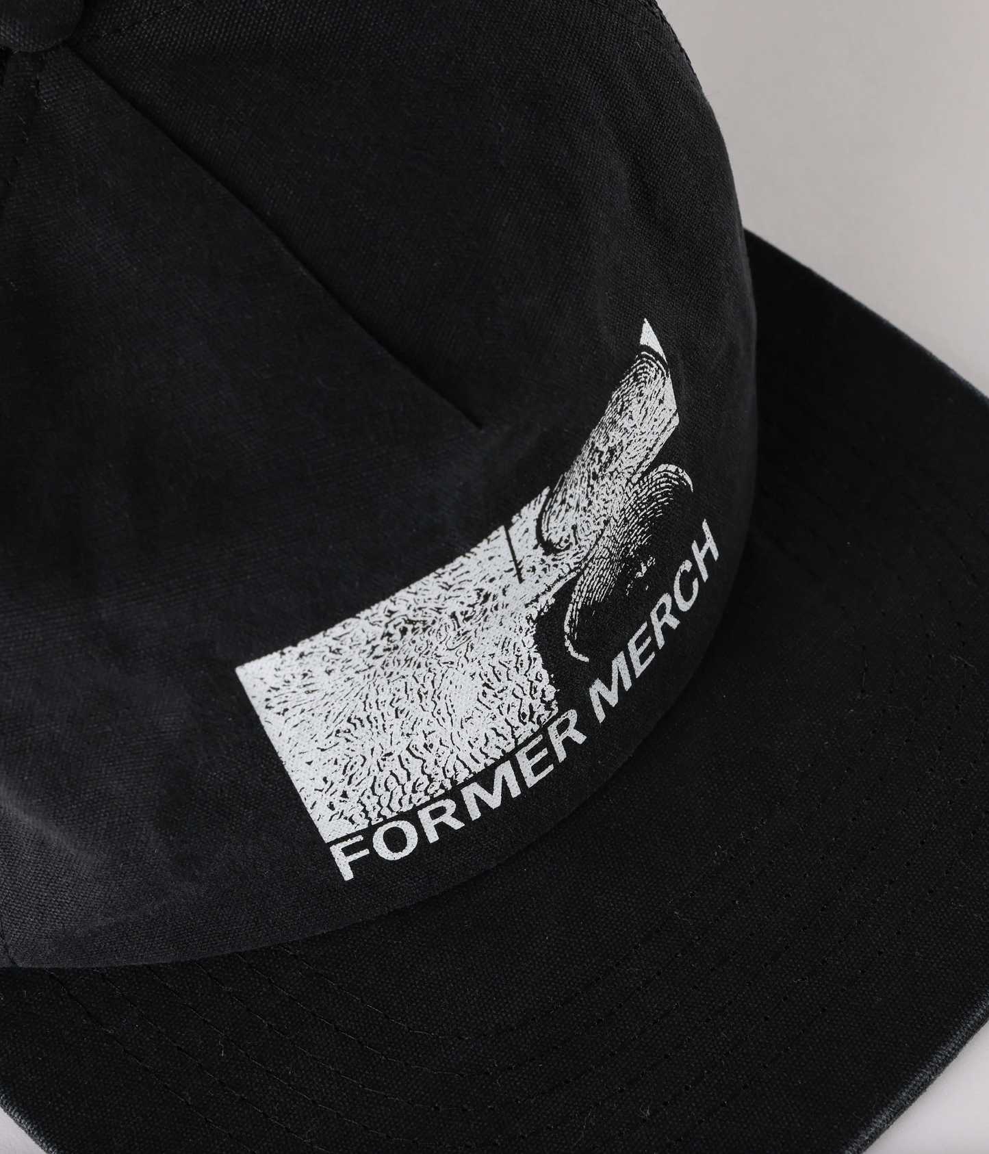 Former Synthesis Trucker Cap